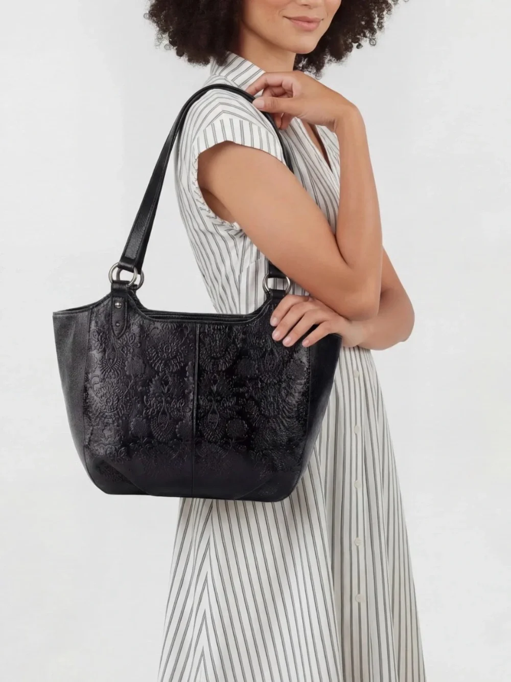 The Sak Bolinas Satchel in Black Floral Embossed Leather